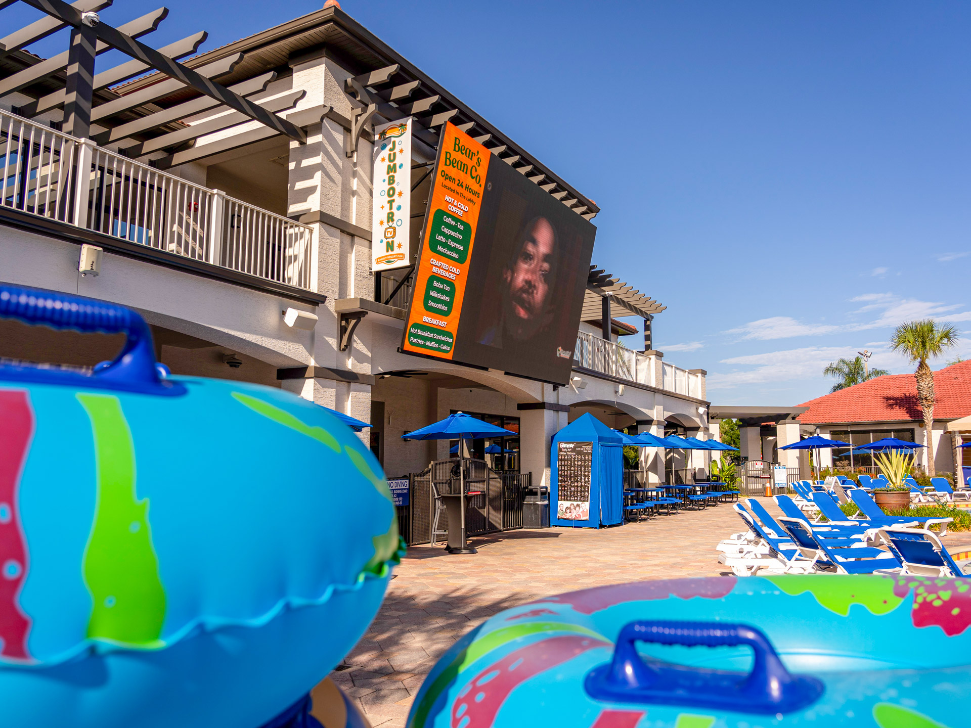 Poolside Jumbotron screen overlooking the waterpark